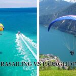 Parasailing vs paragliding: a visual comparison showing a person parasailing while another is paragliding