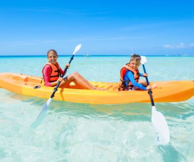 The siblings are trying out water sports for the kids.