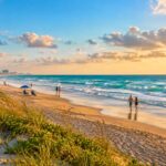 Golden-hour beach walk ideal for quick weekend getaways by the ocean.